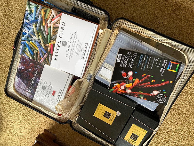 Pastel supplies in suitcase